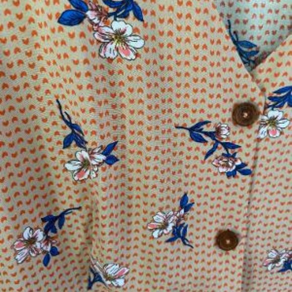 Long sleeved, V-neck, peplum style blouse - Picture 3 of 5